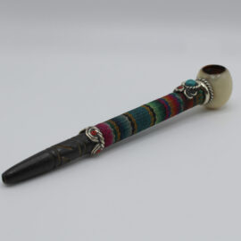 Handmade tobacco pipe hand carved with a tahua seed