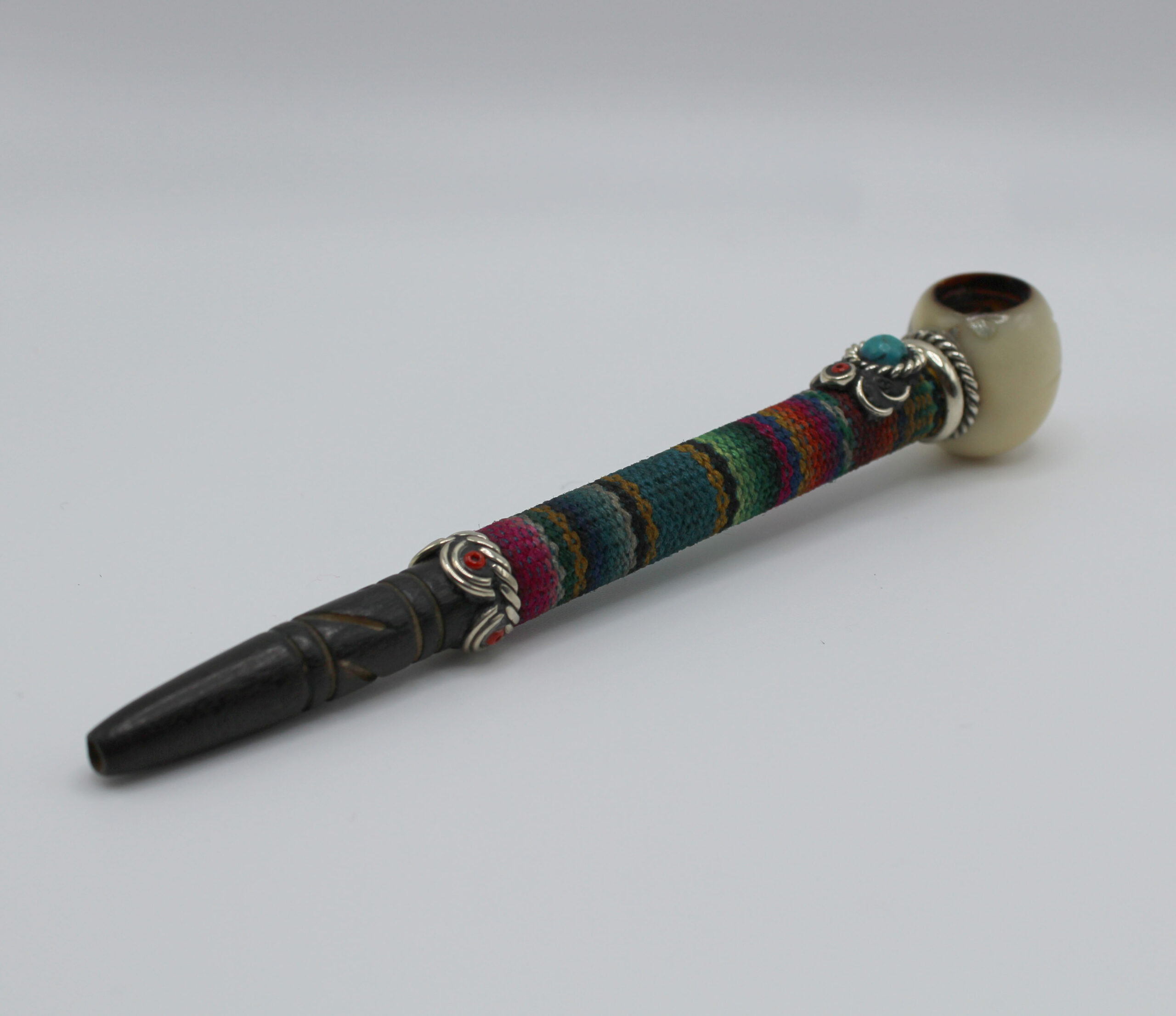 Handmade tobacco pipe hand carved with a tahua seed
